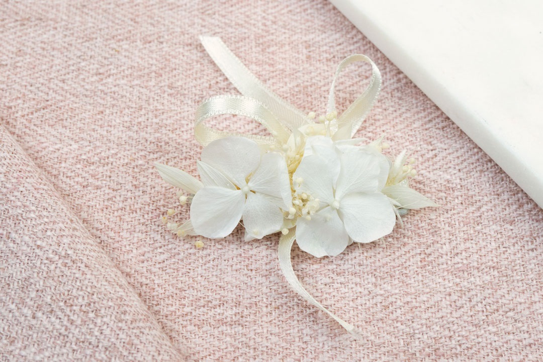 boutonnière et le bracelet Wendy
